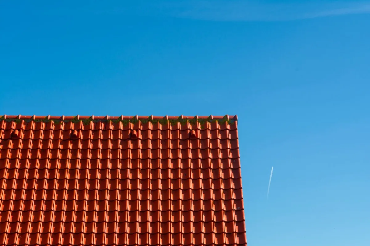 Tile roof gable in full sun, the kind of exposure that sets roof life in Monroe, LA